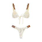 Crochet bikini set with brown straps on a white background