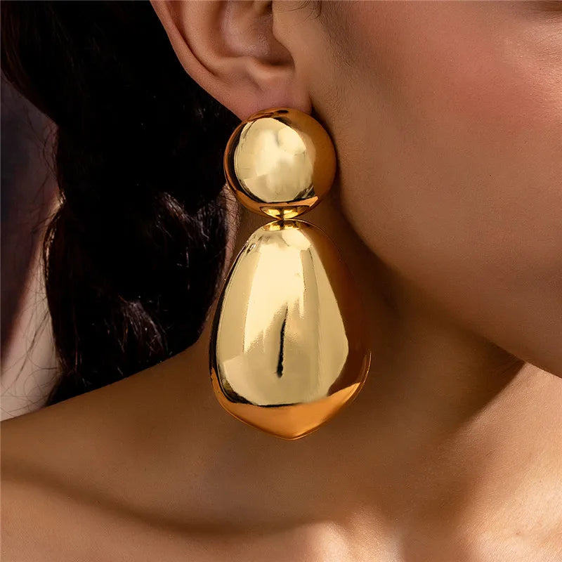 Boucles d'oreilles pendantes exagérées