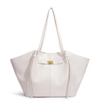 White handbag with a gold clasp on a white background