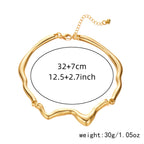 Gold bracelet with measurement details on a white background
