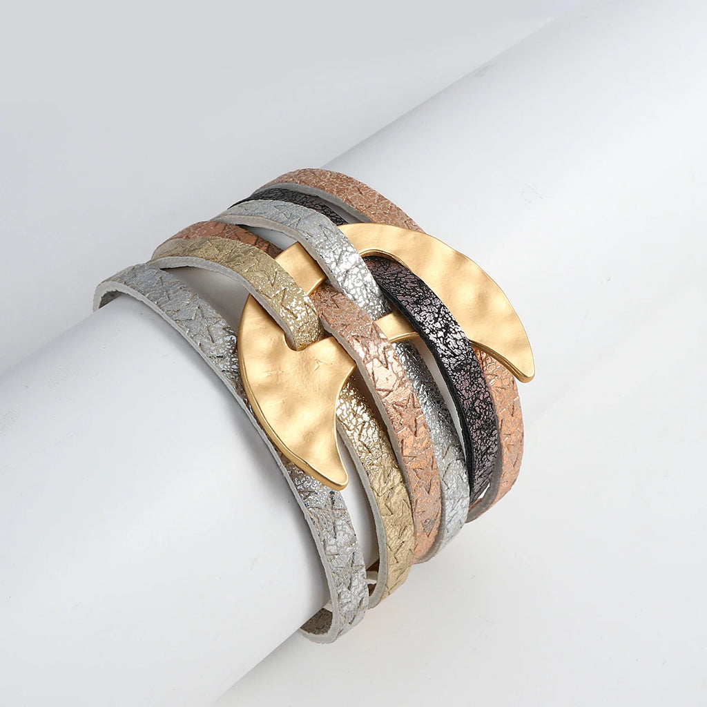 Multicolored cuff bracelet on a light gray background