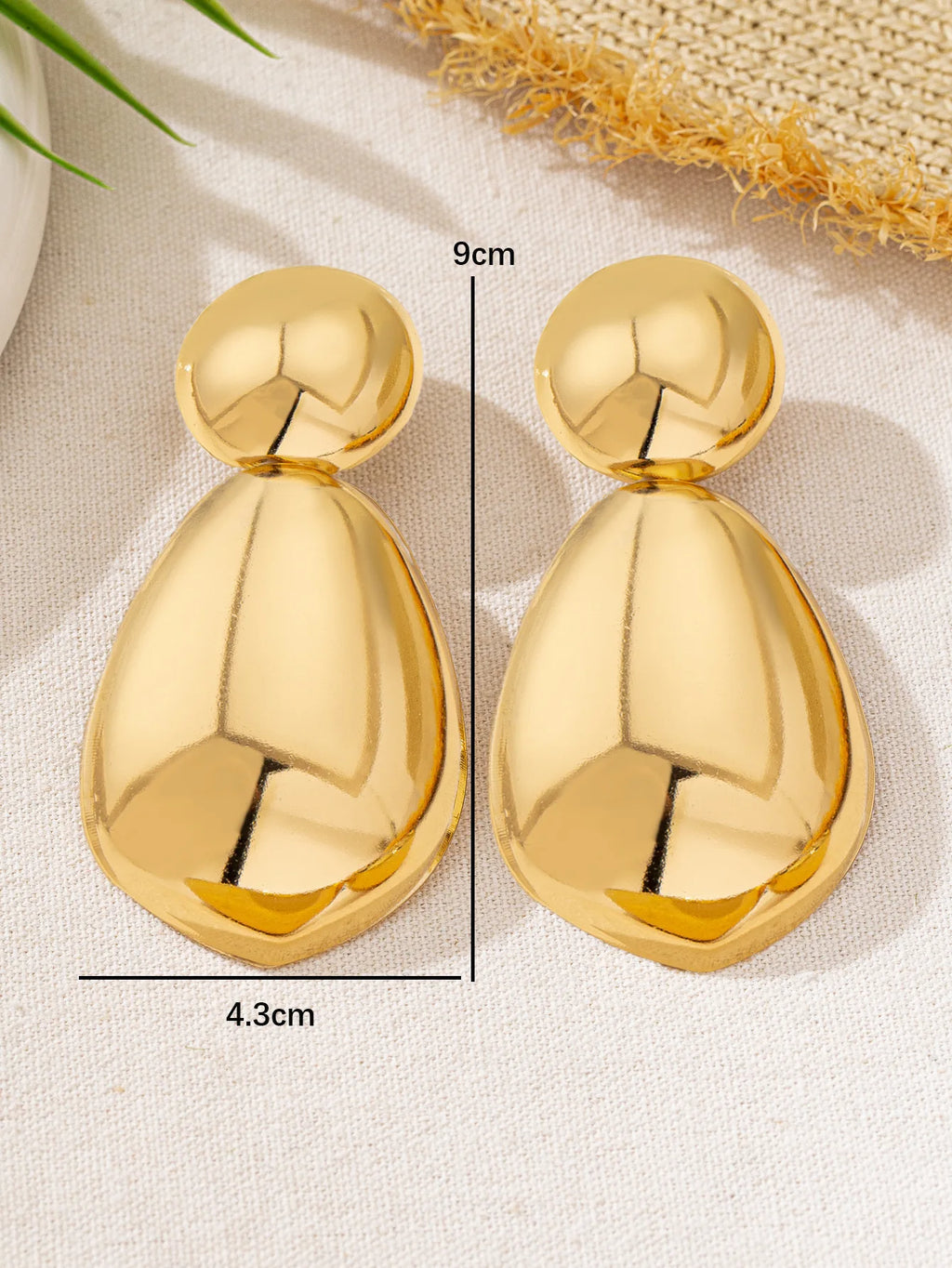 Boucles d'oreilles pendantes exagérées