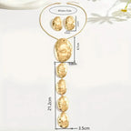 Gold necklace and earrings with measurements on a white background