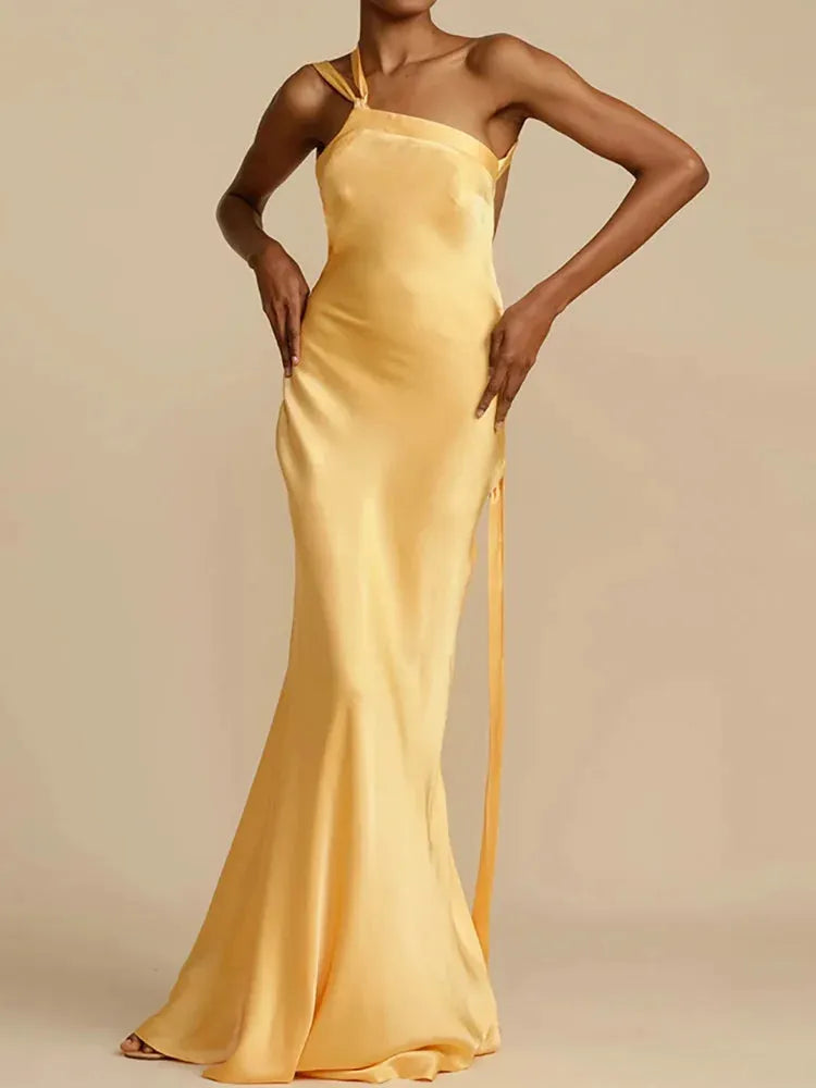 Yellow evening gown on a neutral background