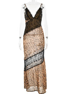 Dress with leopard print and lace details on a mannequin against a white background