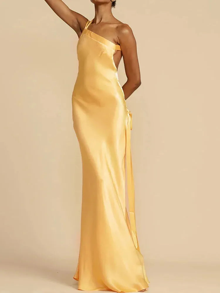 Yellow evening gown on a neutral background