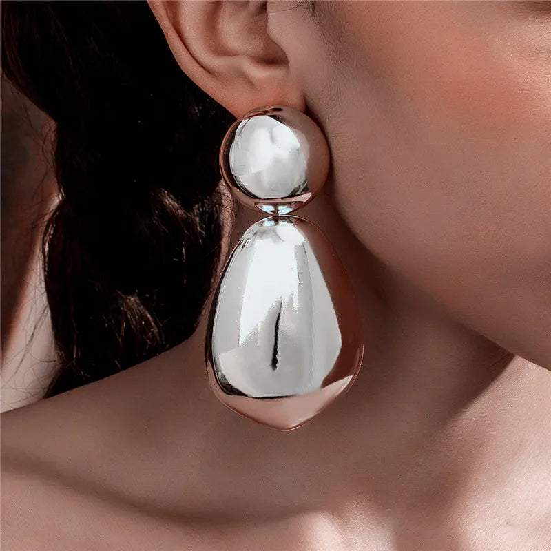 Boucles d'oreilles pendantes exagérées