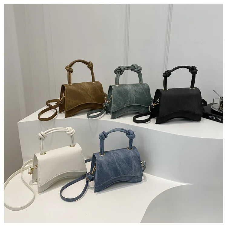 Knott Flap Crossbody Bag