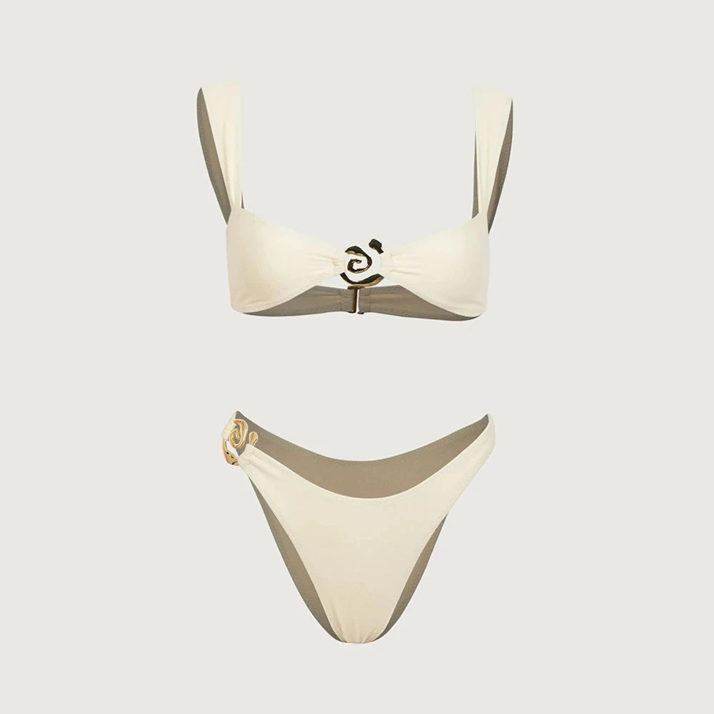 Beige bikini set on a light gray background