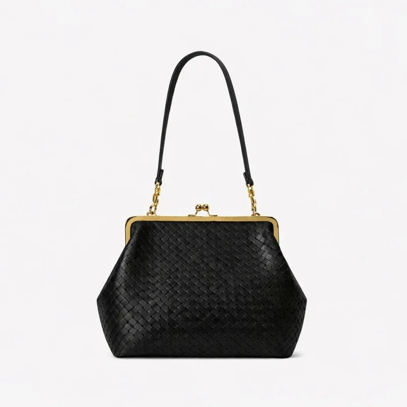 Black woven leather handbag with a gold kiss-lock frame and a single shoulder strap, shown on a plain white background.