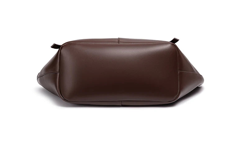 Brown leather bag on a white background