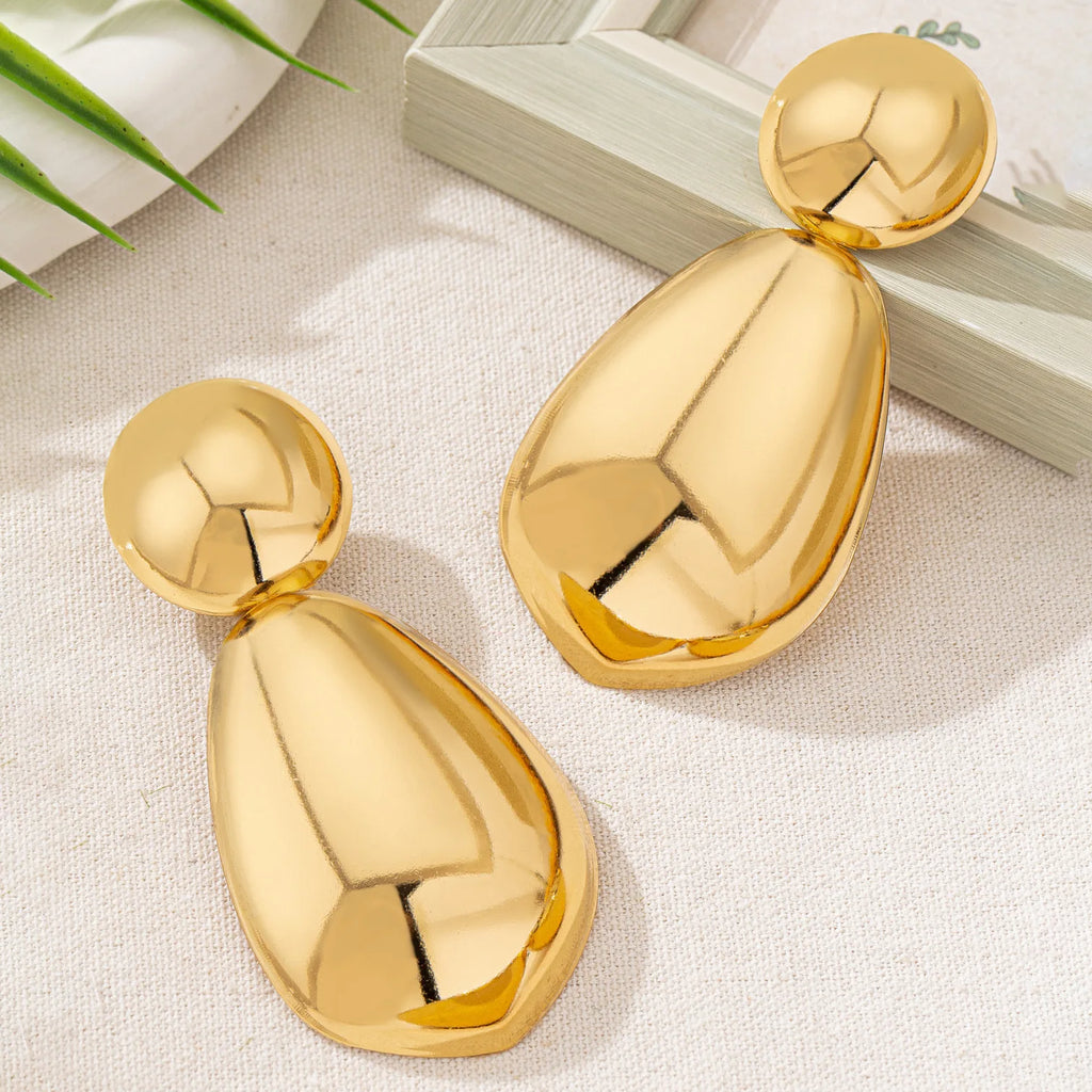 Boucles d'oreilles pendantes exagérées