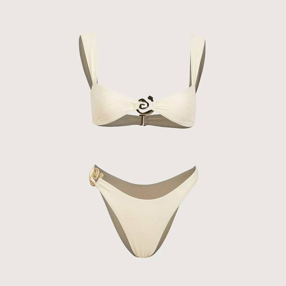 Beige bikini set on a light gray background