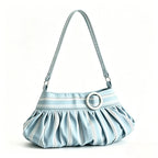 A light blue and white striped shoulder bag with a pleated ruffled body, a silver-tone circular ring detail on the front, and a matching shoulder strap, shown against a plain white background.